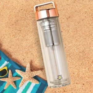 Infuser bottle being used at the beach