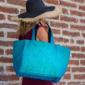 woman carrying terra tote bag